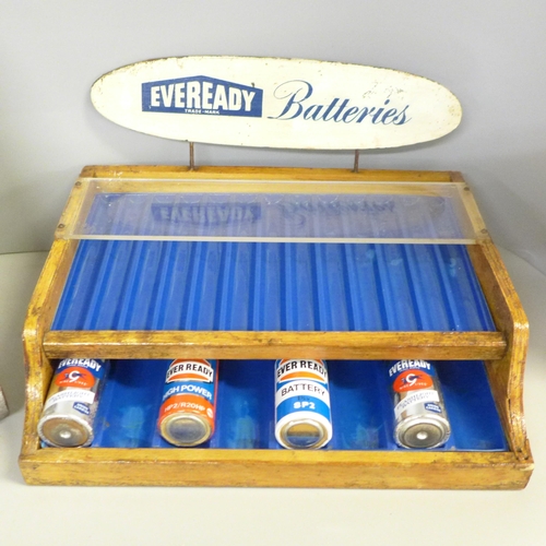 747 - One Vintage 'Eveready' flashlight batteries display metal stand, plus four batteries and a vintage w... 