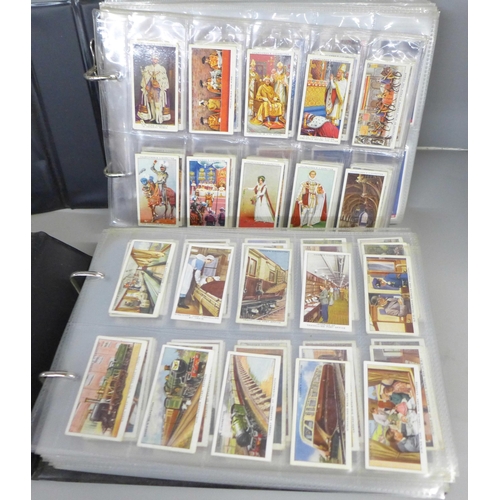 750 - Two albums of cigarette cards; Wills, Gallaher, John Player, Ardath, Churchmans, Senior Service