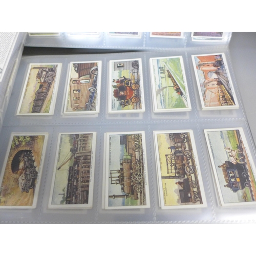 750 - Two albums of cigarette cards; Wills, Gallaher, John Player, Ardath, Churchmans, Senior Service