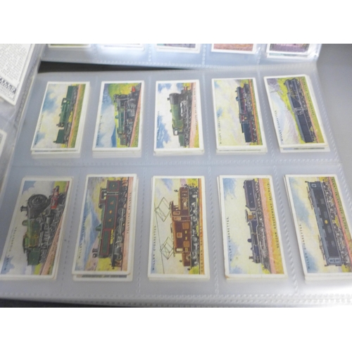 750 - Two albums of cigarette cards; Wills, Gallaher, John Player, Ardath, Churchmans, Senior Service