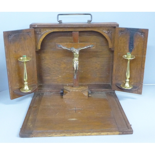 753 - A wooden cased travelling altar