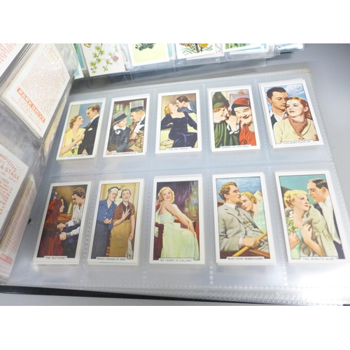 756 - Two albums of cigarette cards; Wills, Gallaher, John Player, Ogdens, Godfrey Phillips