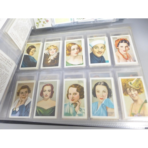 756 - Two albums of cigarette cards; Wills, Gallaher, John Player, Ogdens, Godfrey Phillips