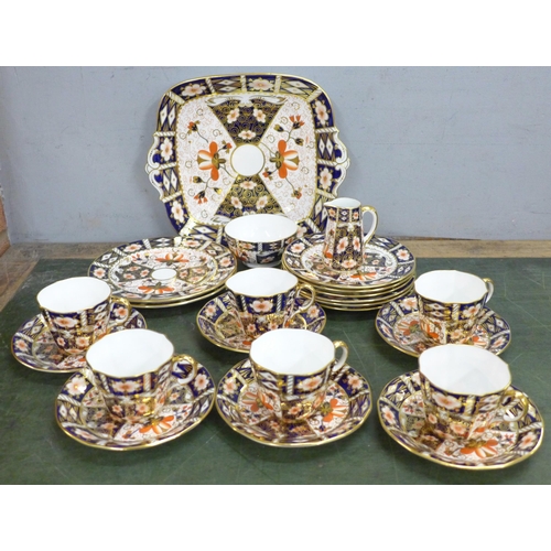 764 - A Royal Crown Derby 2451 Imari six setting tea set, six setting, with two medium plates, bread and b... 