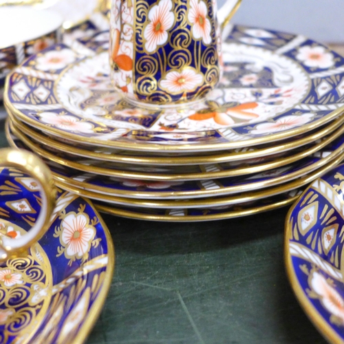 764 - A Royal Crown Derby 2451 Imari six setting tea set, six setting, with two medium plates, bread and b... 