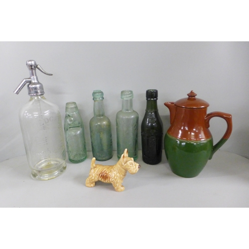 771 - A Langley Jug, a Sylvac terrier, Redgate Limited, Nottingham vintage soda bottle, four regional vint... 