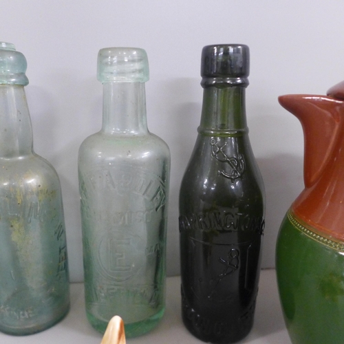 771 - A Langley Jug, a Sylvac terrier, Redgate Limited, Nottingham vintage soda bottle, four regional vint... 