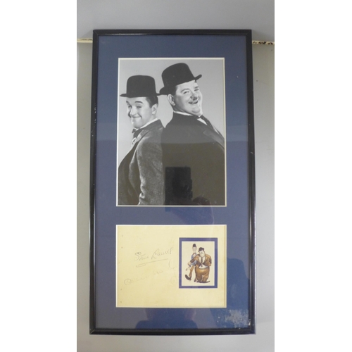 772 - A framed Laurel & Hardy photograph with signatures and certificate of authenticity