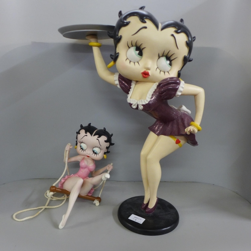 778 - One Fleish Betty Boop in a swing figure and a medium size Fleish Betty Boop with serving tray, 53cm