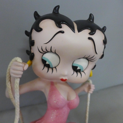 778 - One Fleish Betty Boop in a swing figure and a medium size Fleish Betty Boop with serving tray, 53cm