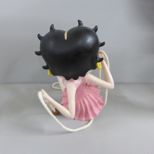 778 - One Fleish Betty Boop in a swing figure and a medium size Fleish Betty Boop with serving tray, 53cm