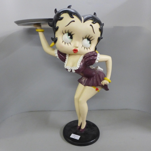 778 - One Fleish Betty Boop in a swing figure and a medium size Fleish Betty Boop with serving tray, 53cm