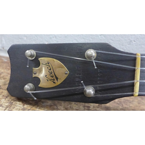 794 - A Keech banjo/ukulele, cased