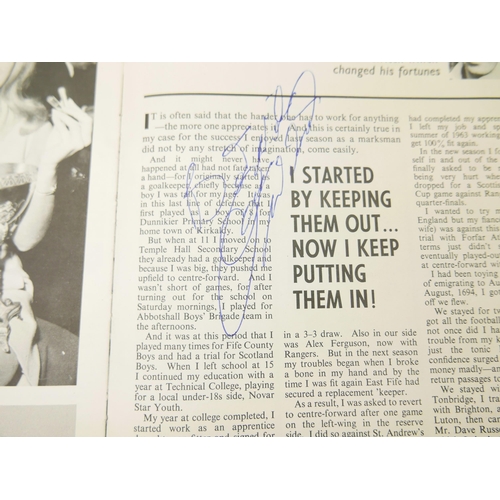 798 - A Charles Buchans 1968 football annual, extensively autographed with signatures including Roger Hunt... 