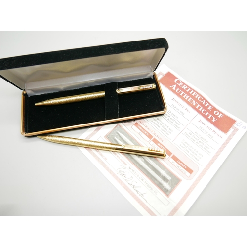 809 - A ballpoint pen and pencil set with Austrian crystals, with certificate of authenticity and box, (in... 