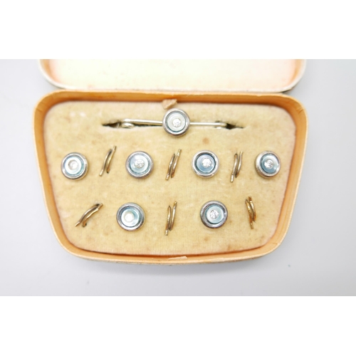 810 - Two cased sets of buttons, one set in sterling silver and one white metal