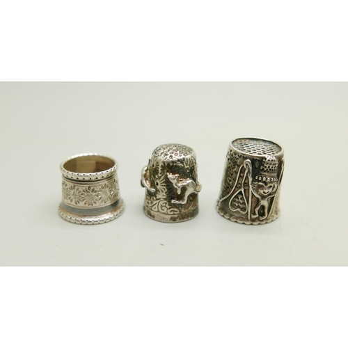 822 - A collection of nine silver thimbles, 53g