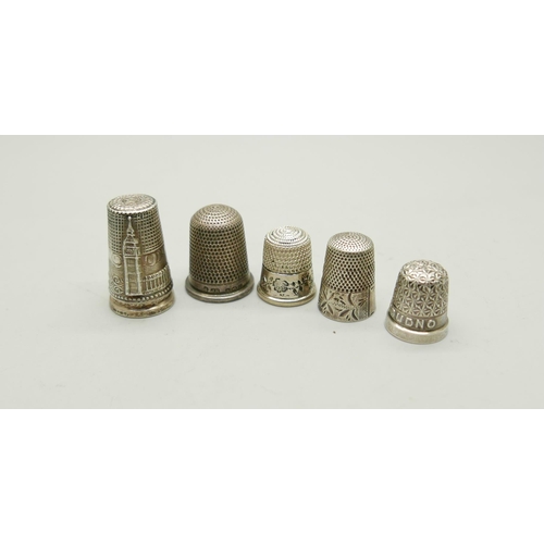 822 - A collection of nine silver thimbles, 53g