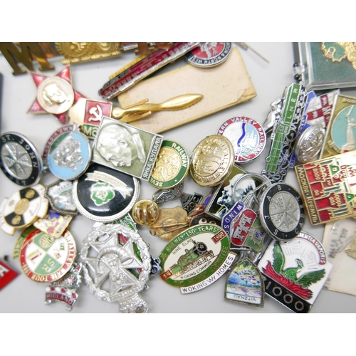 828 - A Special Constabulary medal to Charles R. Griffiths and a collection of railway enamel badges and o... 