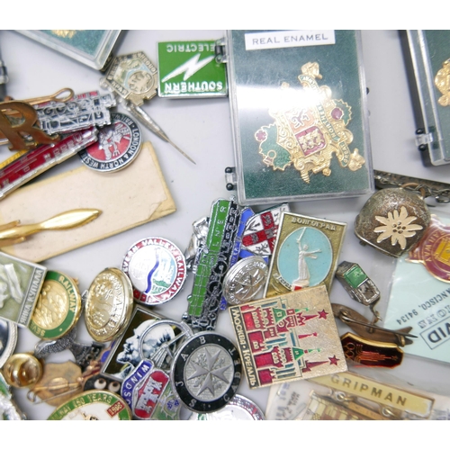 828 - A Special Constabulary medal to Charles R. Griffiths and a collection of railway enamel badges and o... 