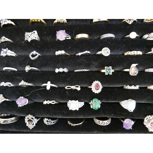 843 - One hundred dress rings including stone set