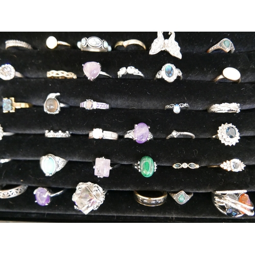 843 - One hundred dress rings including stone set