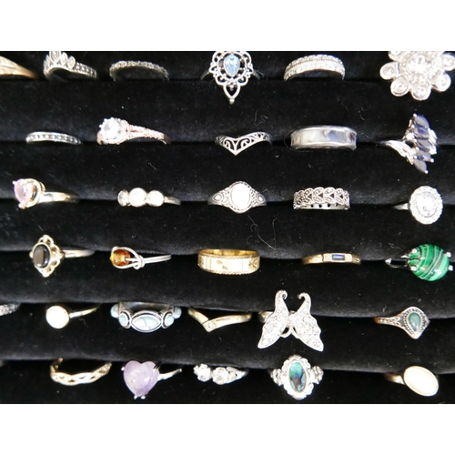 843 - One hundred dress rings including stone set