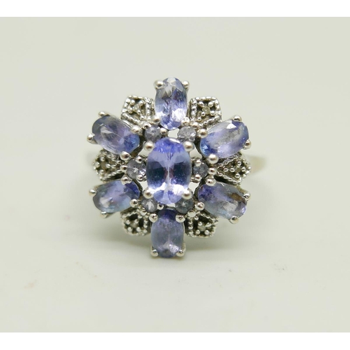 A 9ct white gold, diamond and tanzanite cluster ring, 2.9g, O