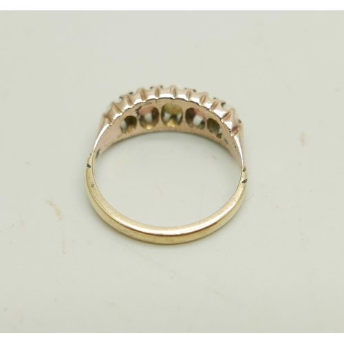 903 - A 9ct gold ring set with five opals, 3g, N