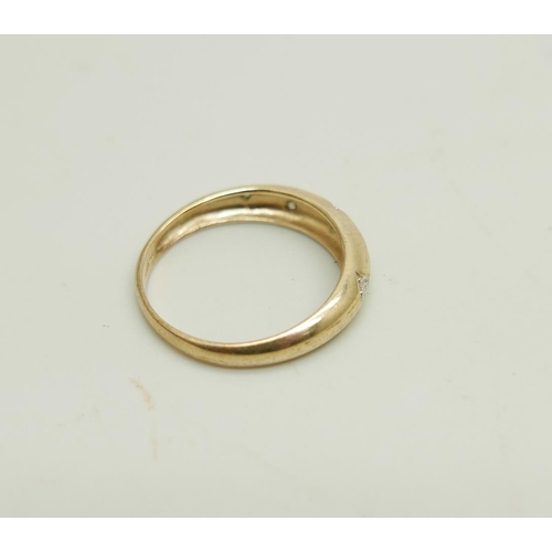 928 - A 9ct gold, five stone diamond ring, 2g, P