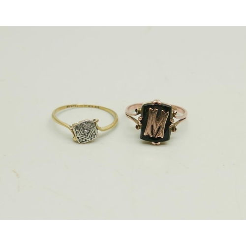 930 - An Art Deco 18ct gold, diamond and platinum ring,  1.5g, M, and a 9ct gold and onyx ring with letter... 