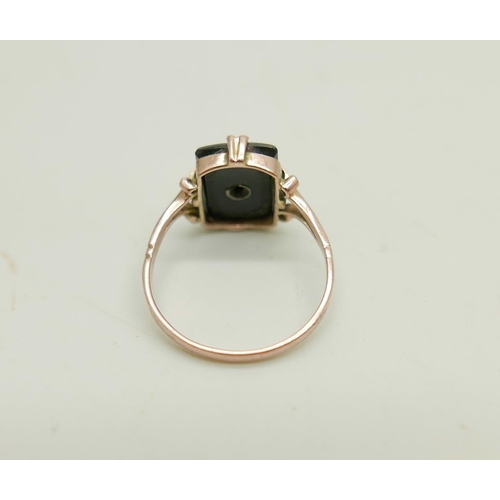 930 - An Art Deco 18ct gold, diamond and platinum ring,  1.5g, M, and a 9ct gold and onyx ring with letter... 