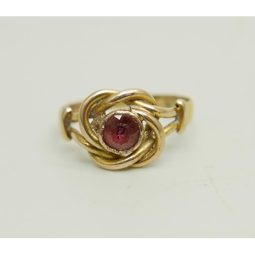 931 - A Victorian 18ct gold ruby solitaire knot ring, Birmingham 1873, 2.6g, O