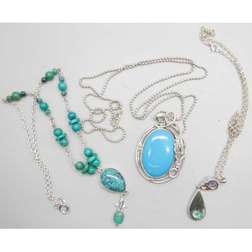 958 - A silver and stone set necklet, and two silver pendants and chains, largest pendant 6cm including ba... 