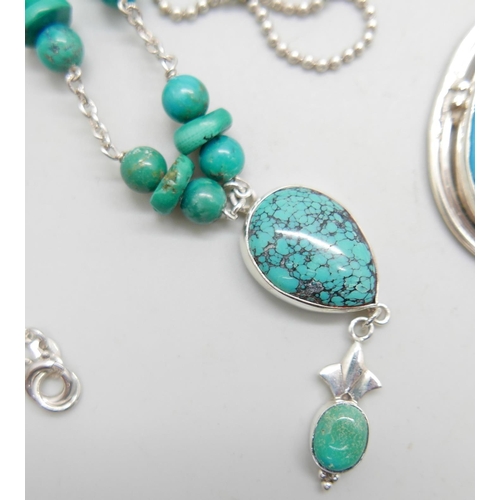 958 - A silver and stone set necklet, and two silver pendants and chains, largest pendant 6cm including ba... 