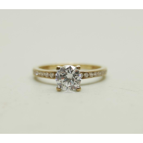 988 - A 9ct gold ring set with white stones, 1.7g, M