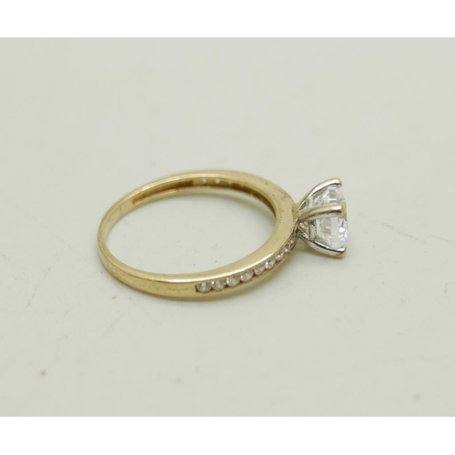 988 - A 9ct gold ring set with white stones, 1.7g, M