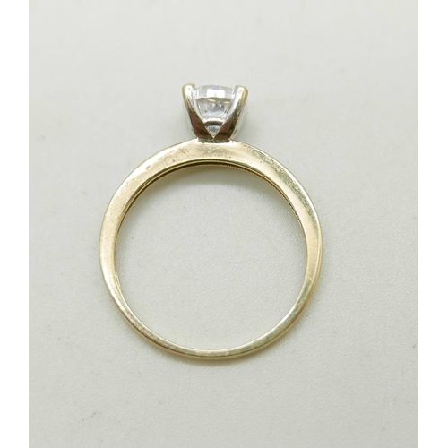 988 - A 9ct gold ring set with white stones, 1.7g, M