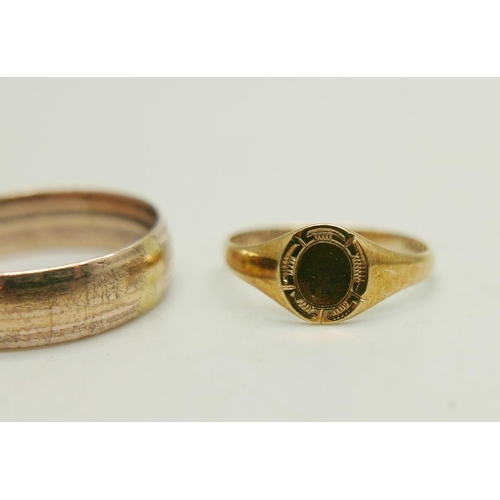 989 - Two 9ct gold signet rings, 1.8g total, size E and K, together with a rolled gold ring