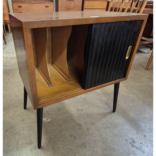 37 - A tola wood and black tambour front record cabinet