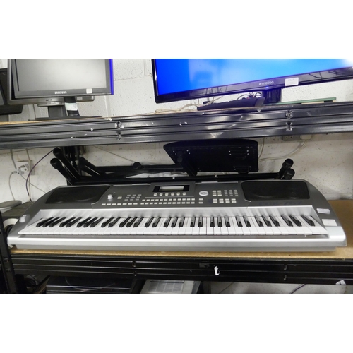 2125 - A Chase CDK767 76 key 4 way speaker electric keyboard with stool, stand, power cable, headphones and... 