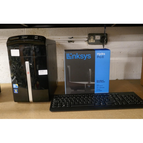 2140 - A Packard Bell iMedia S3810 personal computer, a Lenovo wireless keyboard and a Linksys Hydra Pro6 d... 