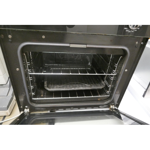 2162 - A New World glass fronted integrated single oven