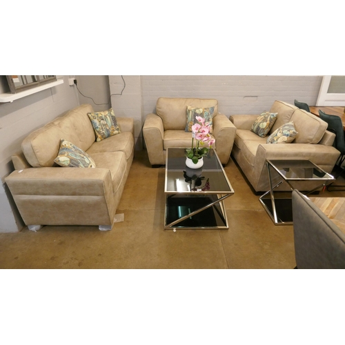 1314 - A Champagne PU suede three seater sofa, two seater sofa and armchair