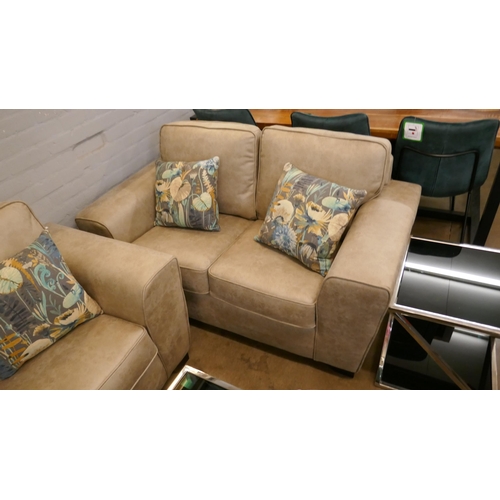 1314 - A Champagne PU suede three seater sofa, two seater sofa and armchair