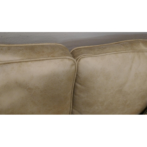 1314 - A Champagne PU suede three seater sofa, two seater sofa and armchair