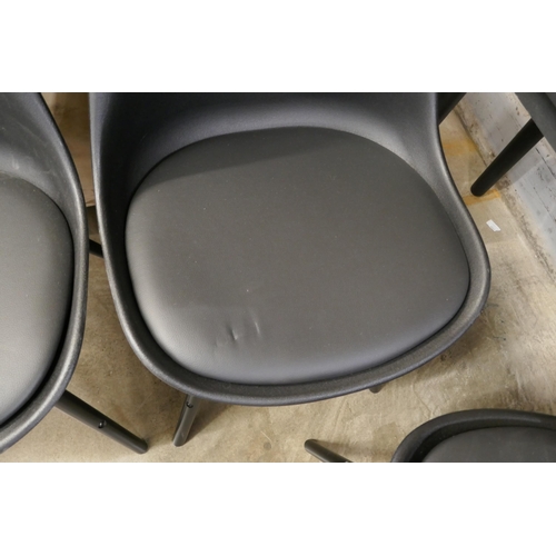 1364 - A set of four black Eames style dining chairs *This lot is subject to VAT