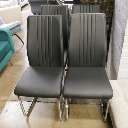 1367 - A set of four black & chrome dining chairs *This lot is subject to VAT