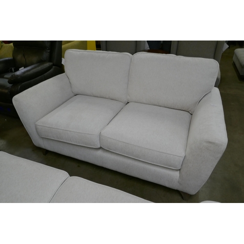 1376 - An off white fabric pair of two seater Sofas