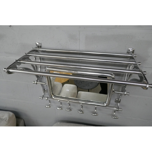 1383 - A polished chrome luggage rack